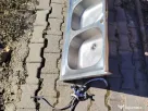 Vând chiuveta inox cu doua cuve și scurgător stare f.b. plus baterie inox cu robineți inox gama,,Delinia"
