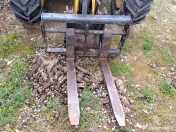 Încărcătorul telescopic Caterpillar TH407 