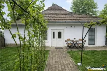 Casa cu 650 mp teren,zona linistita,curte verde,potential ex