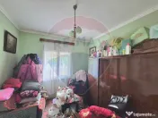 Casă cu teren generos de 1.100 mp, de vânzare în carti...