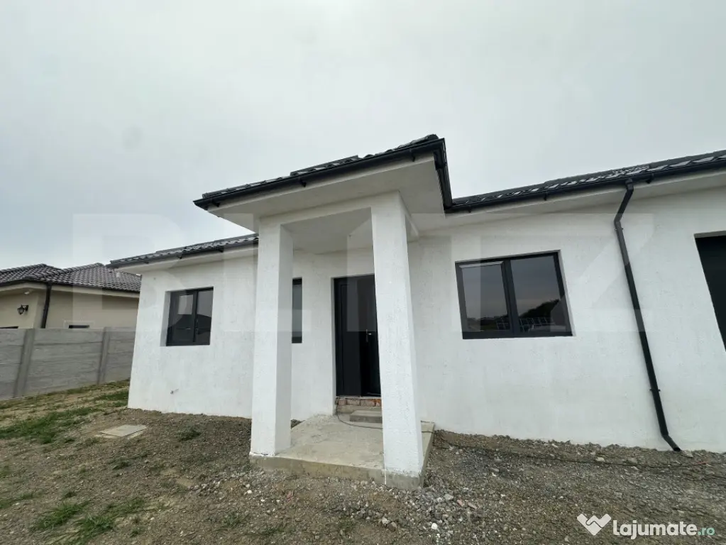 Casă cu garaj, 130 mp, teren 619 mp - zona Cionchesti
