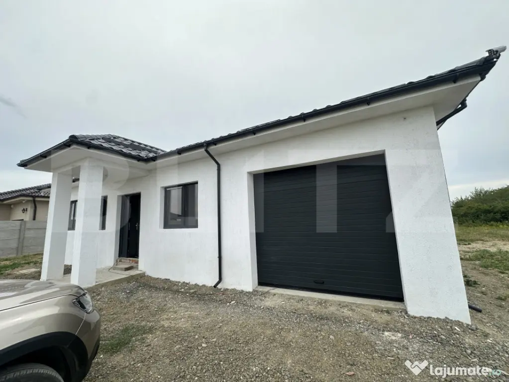 Casă cu garaj, 130 mp, teren 619 mp - zona Cionchesti