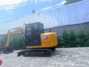 CAT Mini încărcător și mini Excavator