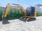 CAT Mini încărcător și mini Excavator