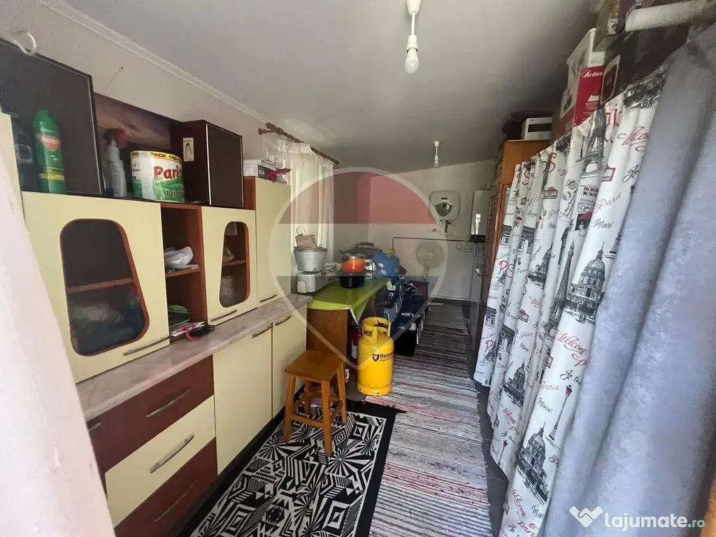 Casă 2 camere teren 6943mp Gologanu