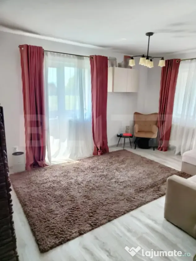 Garsonieră cochetă cu terasă generoasă și loc de parcar