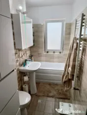 Garsonieră cochetă cu terasă generoasă și loc de parcar 