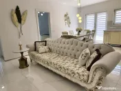 Apartament cu 3 camere si curte de 