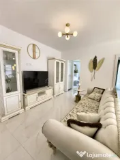 Apartament cu 3 camere si curte de 