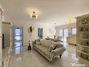 Apartament cu 3 camere si curte de 