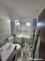 Apartament Modern și Spațios cu 3 Camere și 2 Băi 