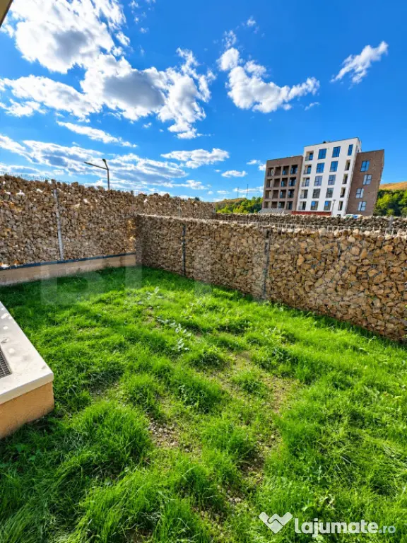 Apartament cu 2 camere, 57 mp, debara, gradina 23 mp, parcar - Floresti (Cluj)
