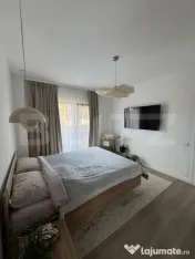 Apartament cu 2 camere, 57 mp, debara, gradina 23 mp, parcar 