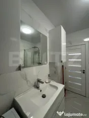 Apartament o camera , loc de parcare, zona Tauti 