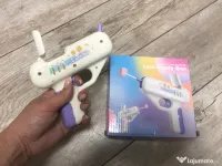 Pistol cu bomboana pe bat surpriza 