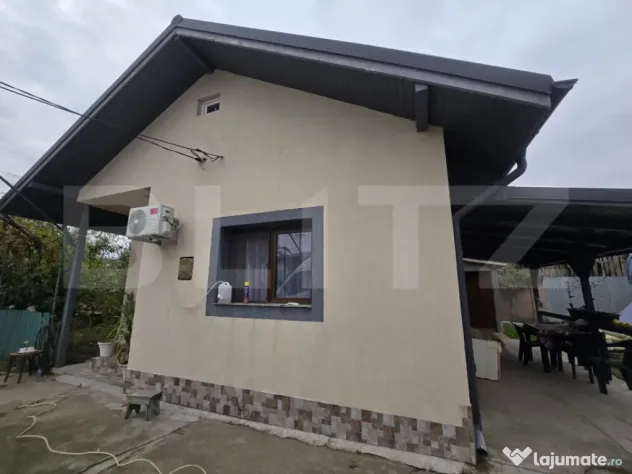 Casă din cărămidă, renovată integral, cu gospodărie î - Cornatelu (Dambovita)