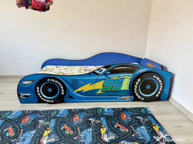 Pat McQueen și covor cars