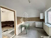 Casa curte comuna, 4 camere si anexe, centrala proprie, zona Balcescu 