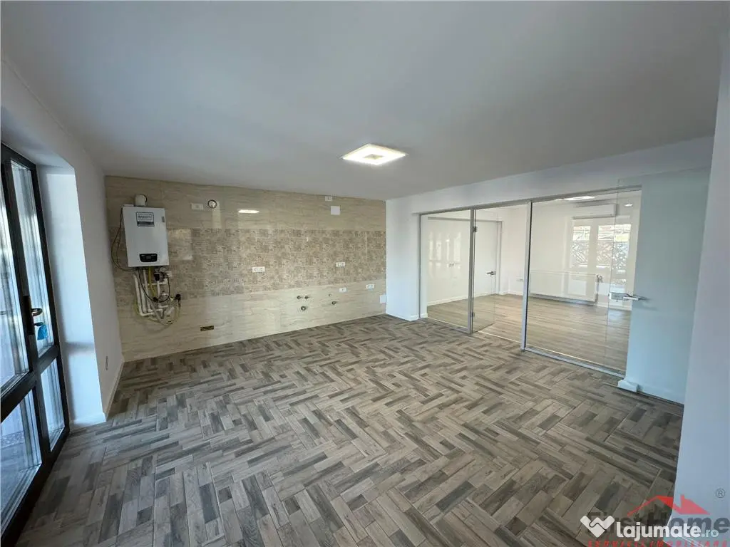 Cladire cu 3 apartamente in suprafata totala construita de 5