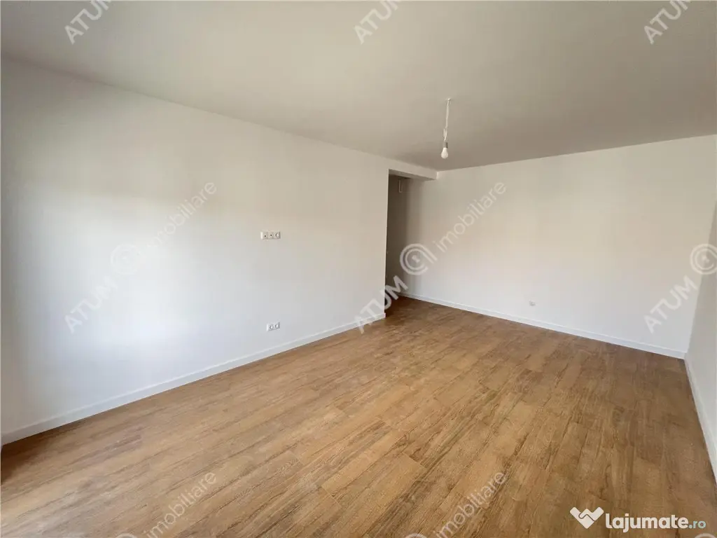 Apartament 2 camere balcon gradina si loc parcare zona Doamn