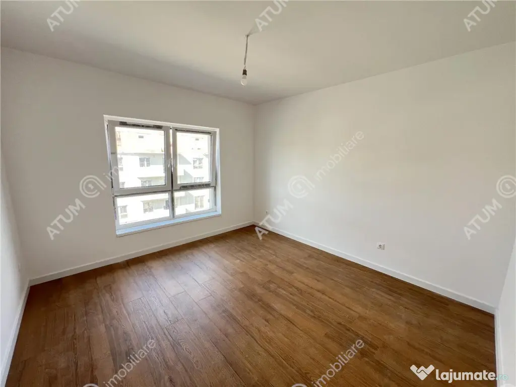 Apartament 2 camere balcon gradina si loc parcare zona Doamn