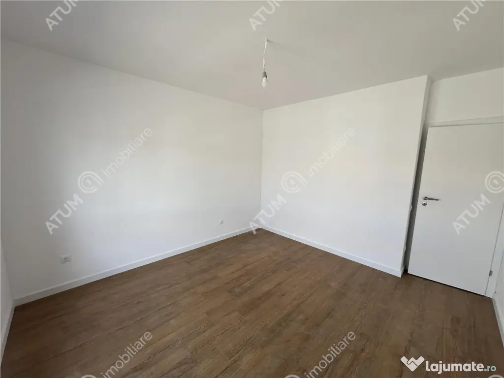 Apartament 2 camere balcon gradina si loc parcare zona Doamn