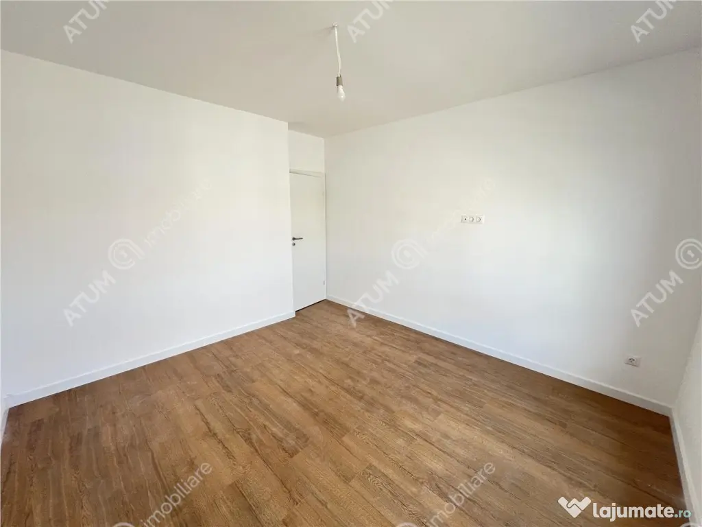 Apartament 2 camere balcon gradina si loc parcare zona Doamn