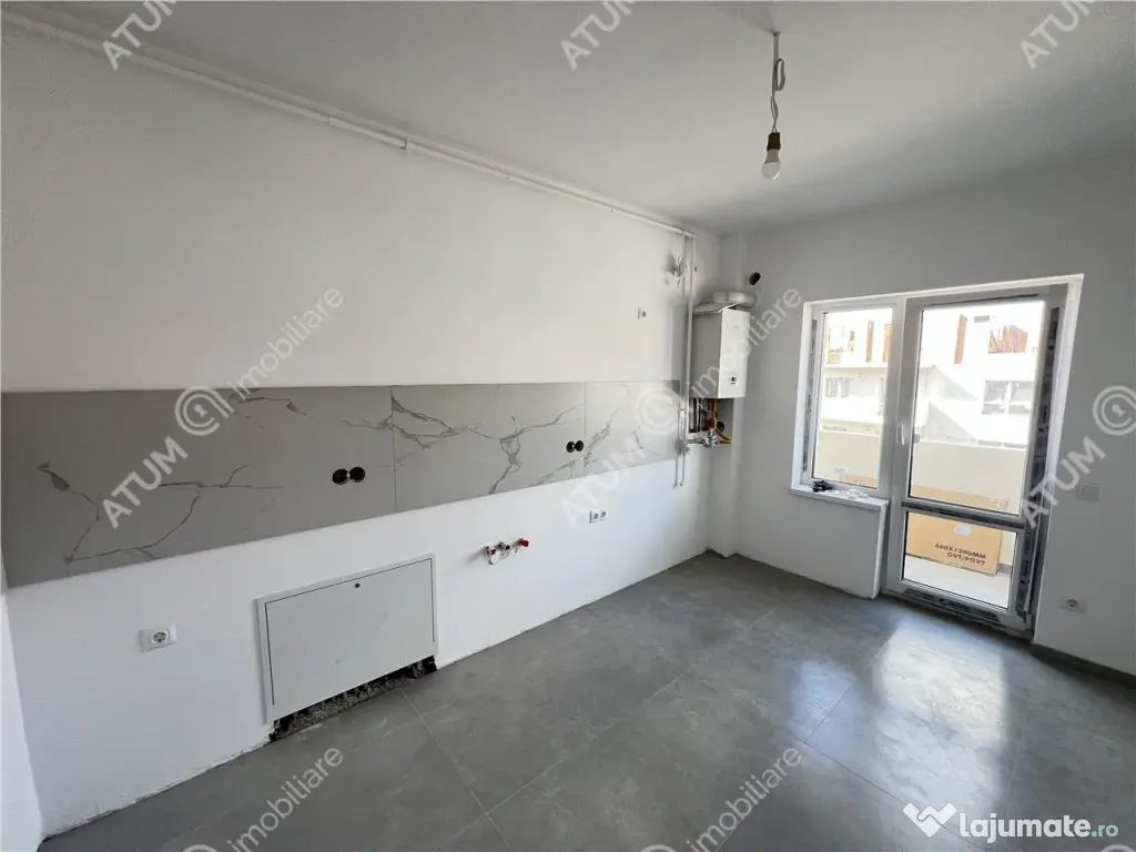 Apartament 2 camere balcon gradina si loc parcare zona Doamn