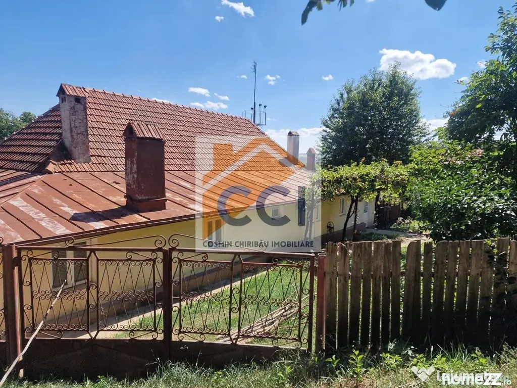 Casa in mediu rural cu teren