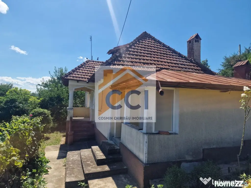 Casa in mediu rural cu teren