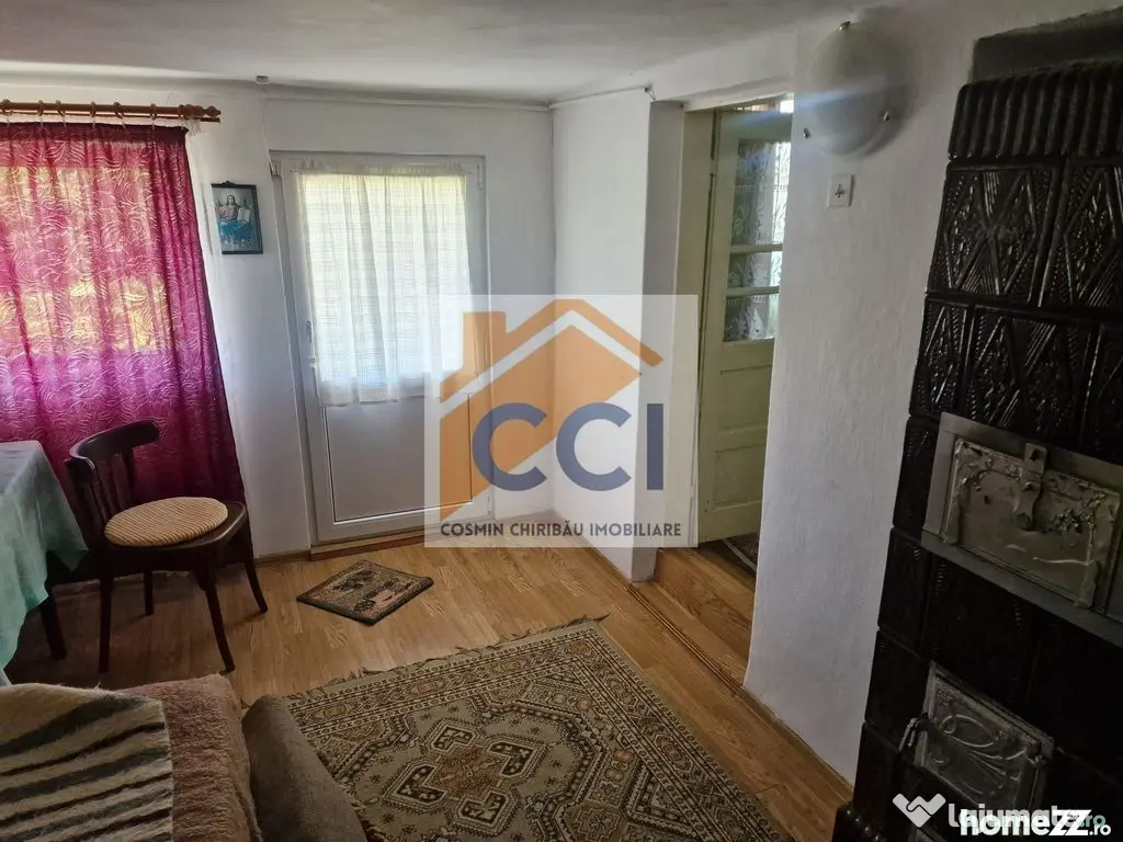 Casa in mediu rural cu teren