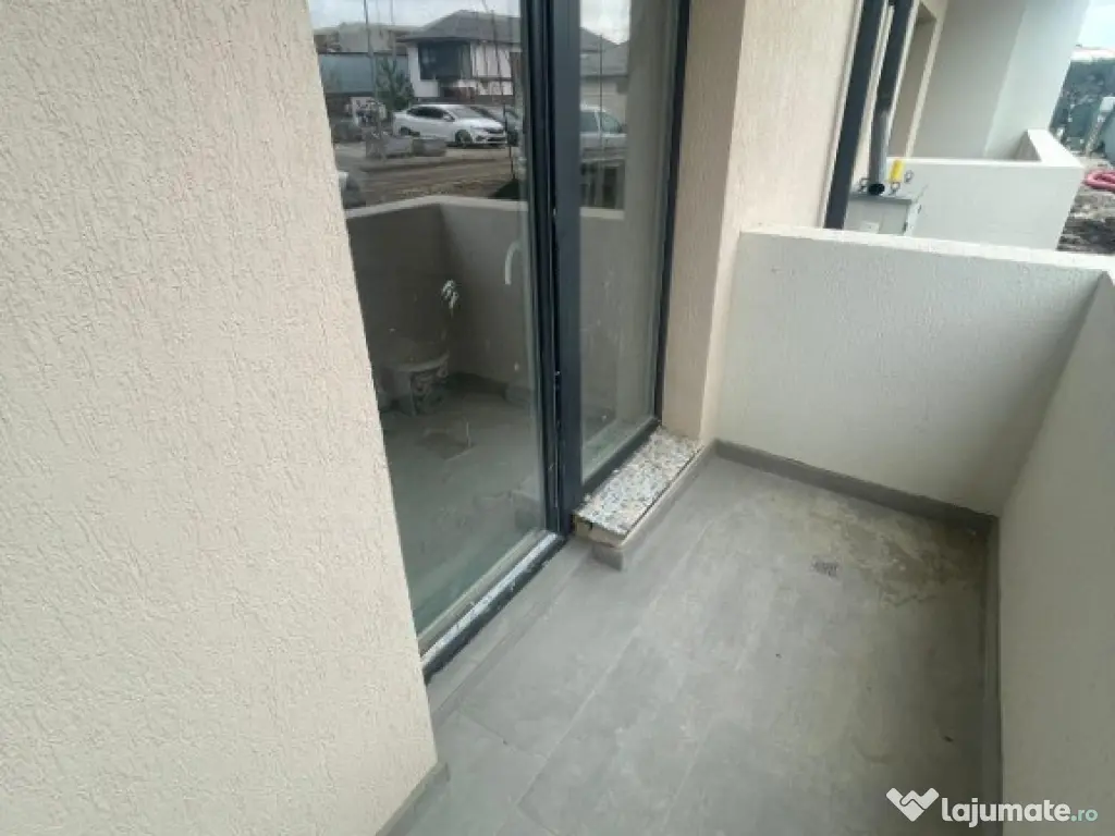 Apartament 2 camere 53 mp + curte 26 mp, toate utilitatile