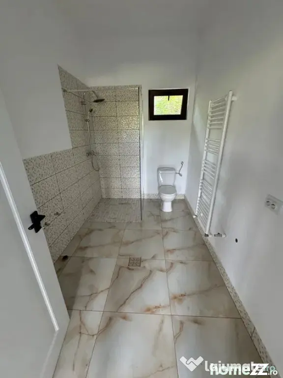 Casă nouă 108 mp cu teren 1.890 mp, zonă liniștită –