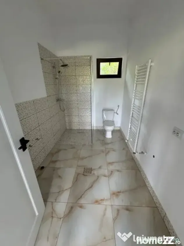 Casă nouă 108 mp cu teren 1.890 mp, zonă liniștită –
