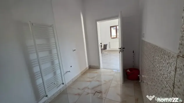 Casă nouă 108 mp cu teren 1.890 mp, zonă liniștită –