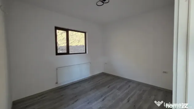 Casă nouă 108 mp cu teren 1.890 mp, zonă liniștită –