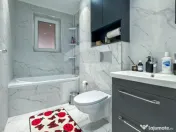 Apartament nou cu grădină 50mp, piscină și 3 locuri parc 
