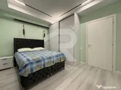 Apartament nou cu grădină 50mp, piscină și 3 locuri parc 