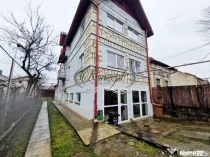 Casa cu o curte comuna in piata 1848