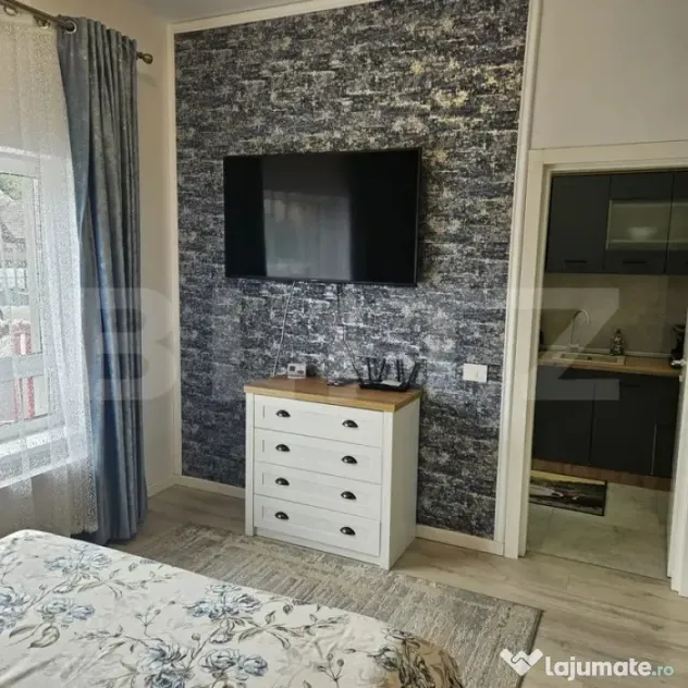 Apartament modern cu parcare – zona Noua