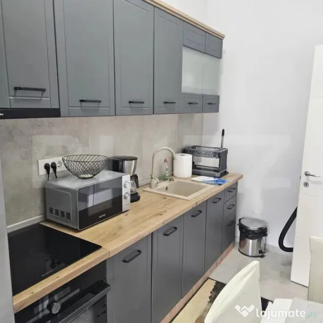Apartament modern cu parcare – zona Noua