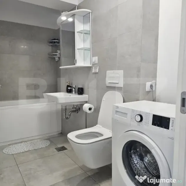 Apartament modern cu parcare – zona Noua
