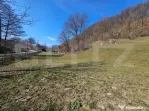 Teren intravilan 6.820 mp cu casă, pădure și râu – Alm