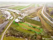 RECO . Teren intravilan cu hala metalica in Roit . 