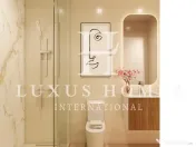 Apartament la parter, cu terasă, piscină și spa, situat aproape de mare 