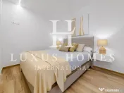 Apartament modern cu piscină comunitară și terasă, situat aproape de plajă 