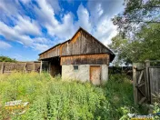 FILM! Apartament 2 camere,decomandat,cu garaj,1.400 mp teren 