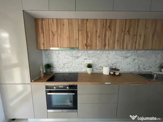 Apartament de inchriat 2 camere,gradina, parcare, Nusco City
