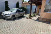 Casă individuală cu curte proprie amenajată și zonă de 