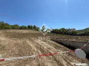 Teren de 12 ari cu panoramă asupra orașului 